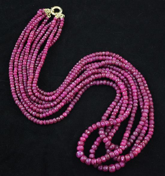 A quadruple strand facetted ruby bead necklace, 22in.